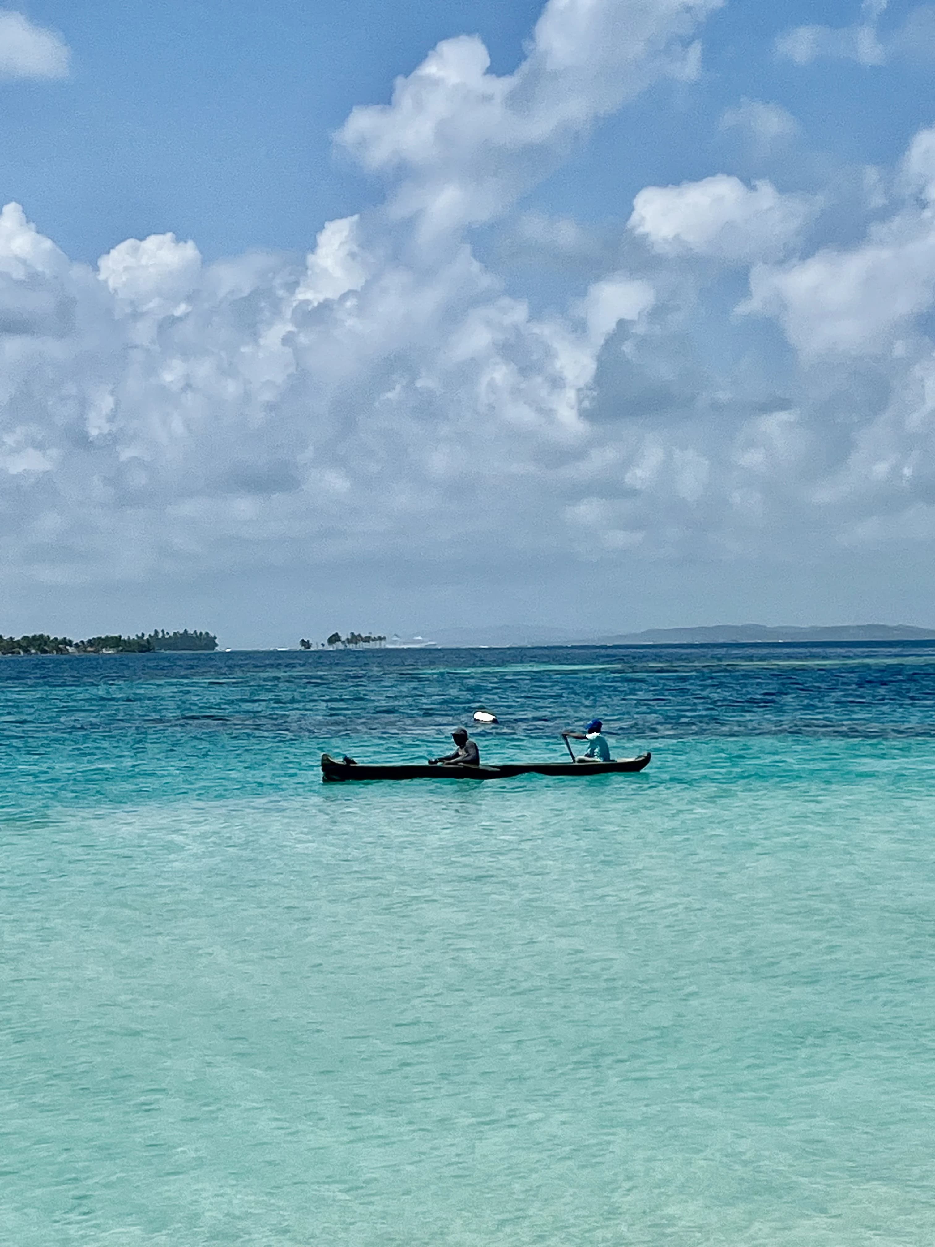 Traditional boat in the crystal-clear waters of San Blas
